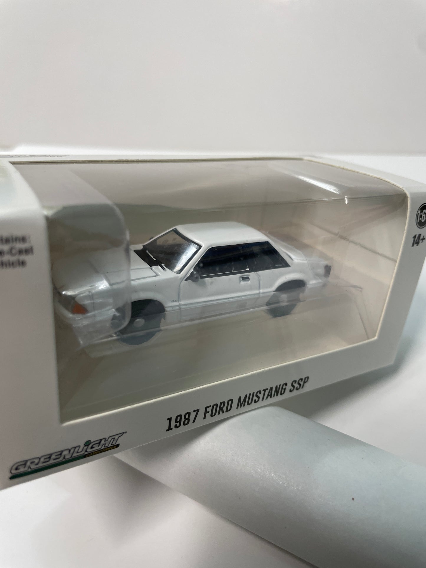 Greenlight 1/64 Hot Pursuit 1987 Ford Mustang SSP White