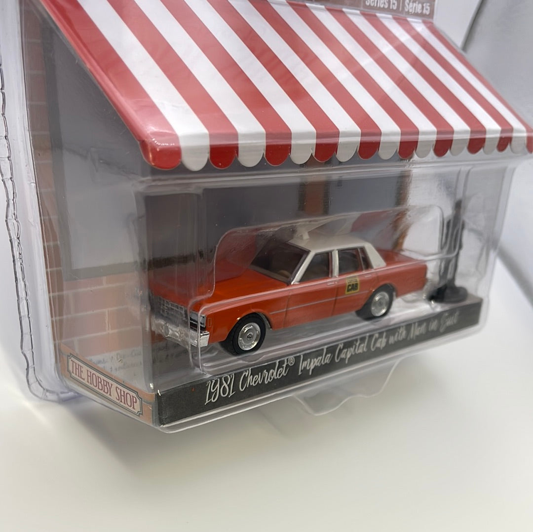 1/64 Greenlight The Hobby Shop Series 15 1981 Chevrolet Impala Capital Cab w/ Man In Suit Orange