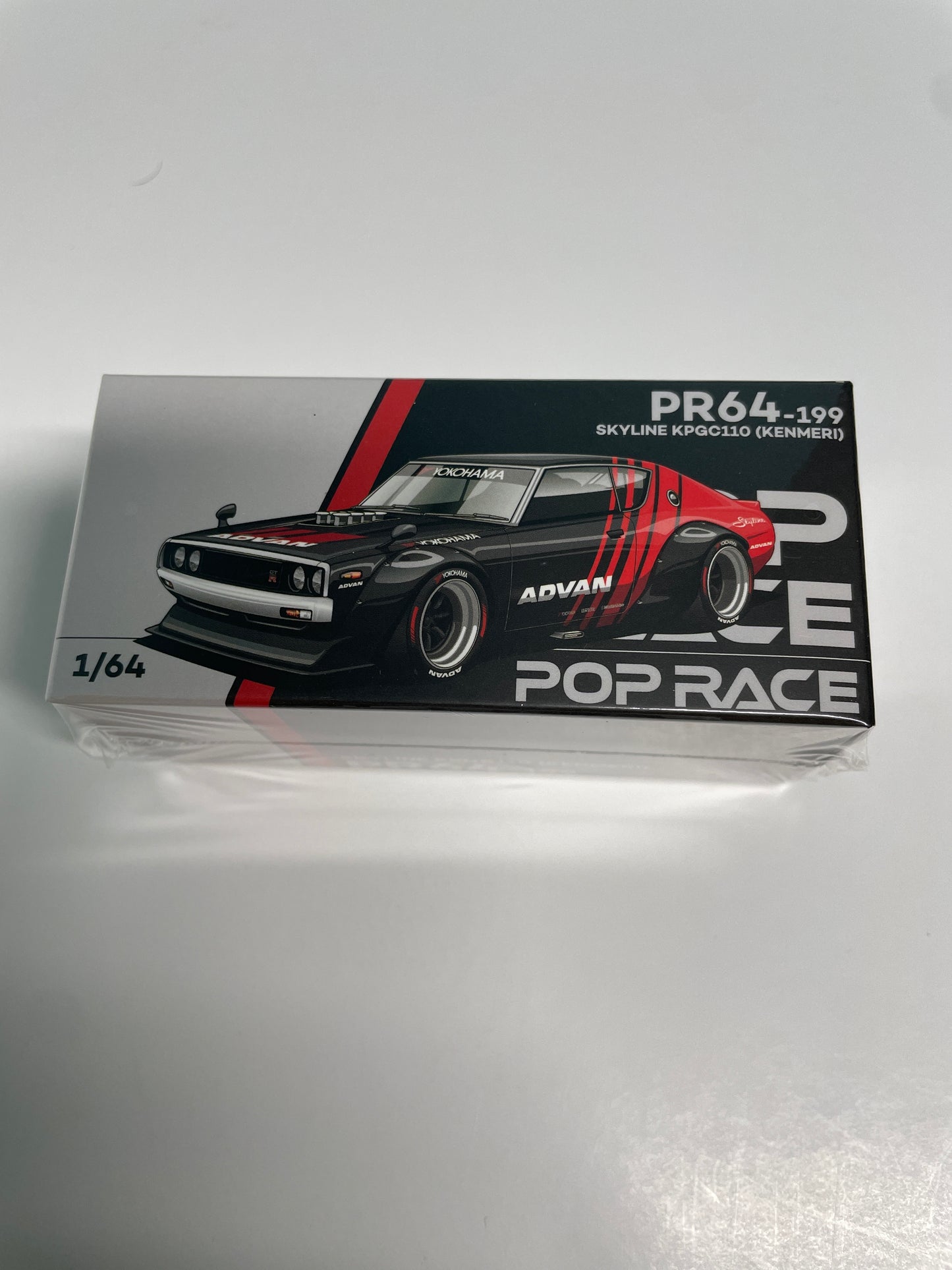 Pop Race 1/64 Nissan Skyline KPGC110 (Kenmeri) Advan Black & Red