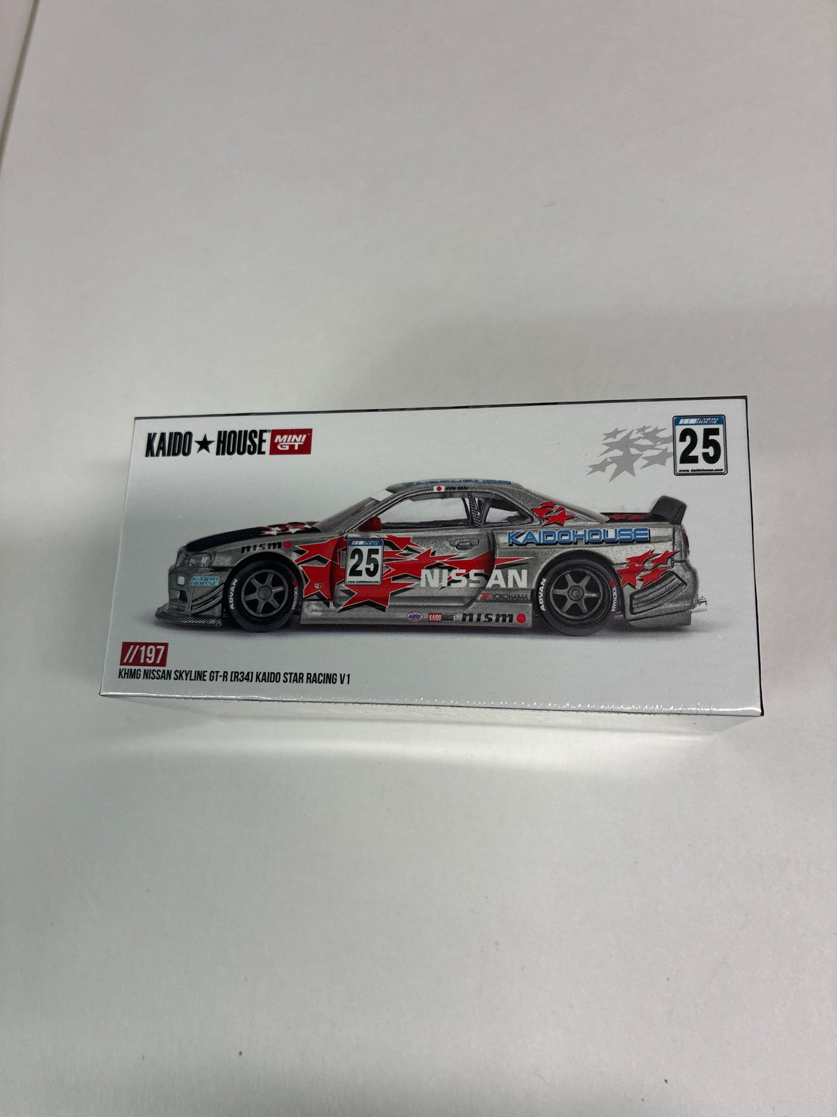 Mini GT x Kaido House 1/64 Nissan Skyline GT-R (R34) Kaido Star Racing V1 Grey - KHMG197