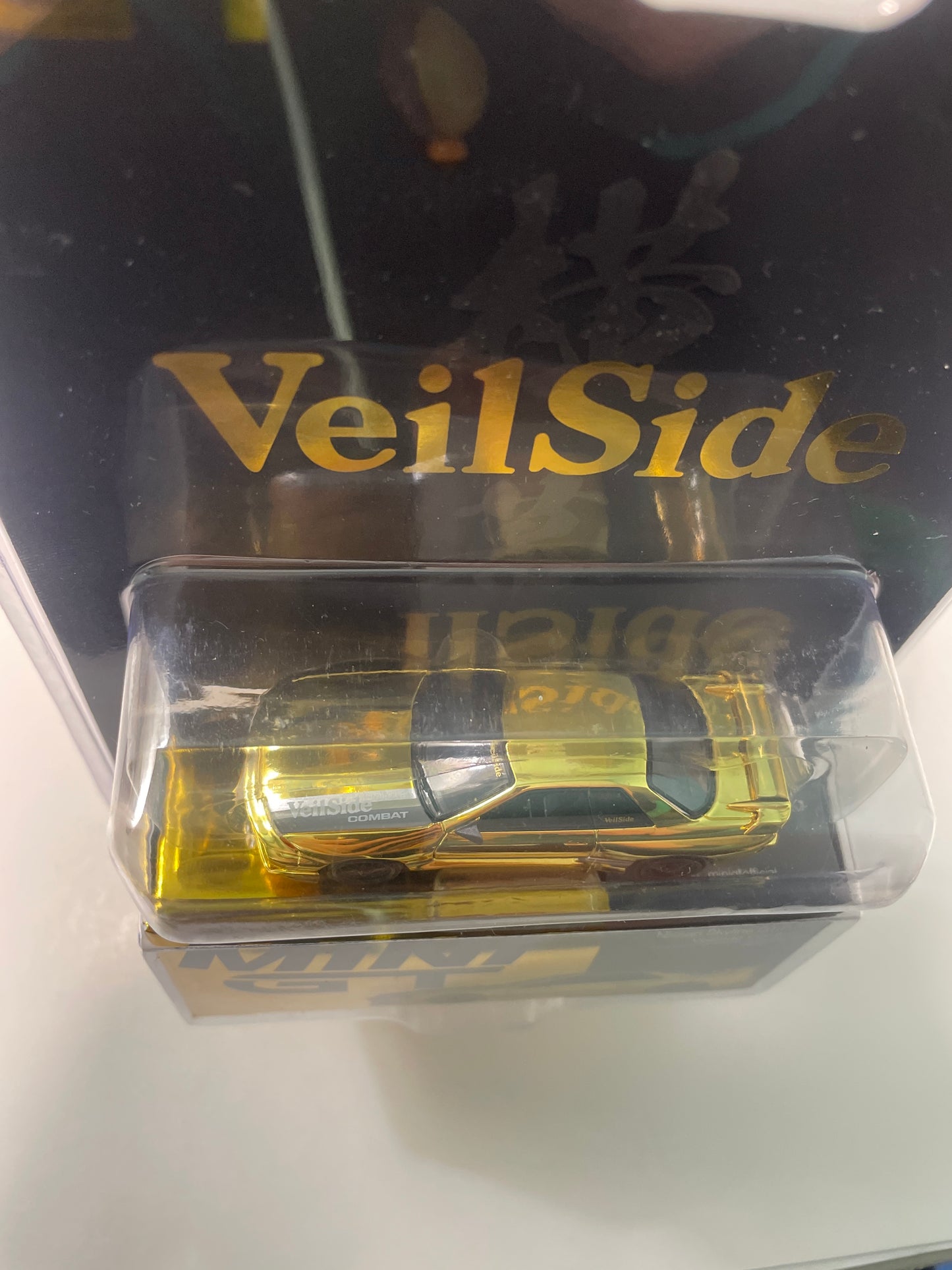 Mini GT 1/64 2026 Tokyo Auto Salon Nissan Skyline GT-R (R32) VeilSide Combat C-1 Gold Chrome & XL T-Shirt - MGT00988-BL - Damaged Car (Read description)