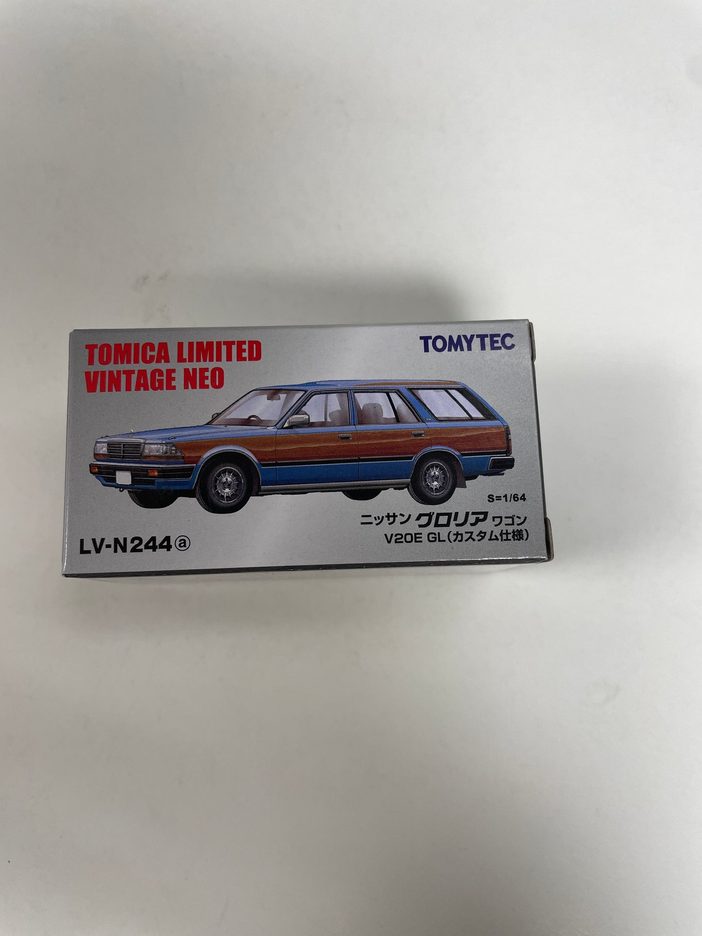 Tomica Limited Vintage Neo 1/64 LV-N244a Nissan Gloria Wagon V20E GL Custom Specification (Blue / Wood Grain)