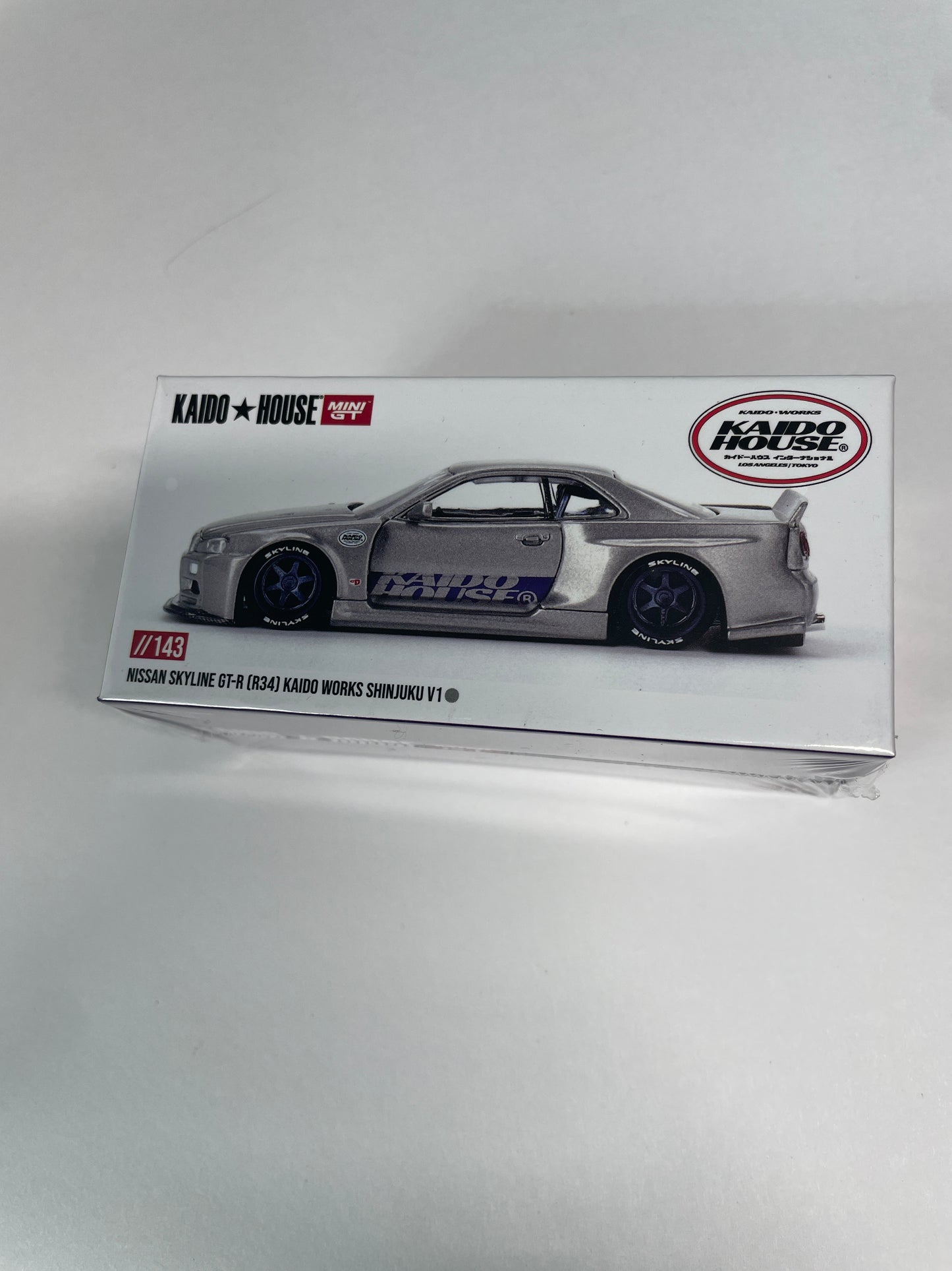 Mini GT x Kaido House 1/64 Nissan Skyline GT-R (R34) Kaido Works Shinjuku v1 Silver