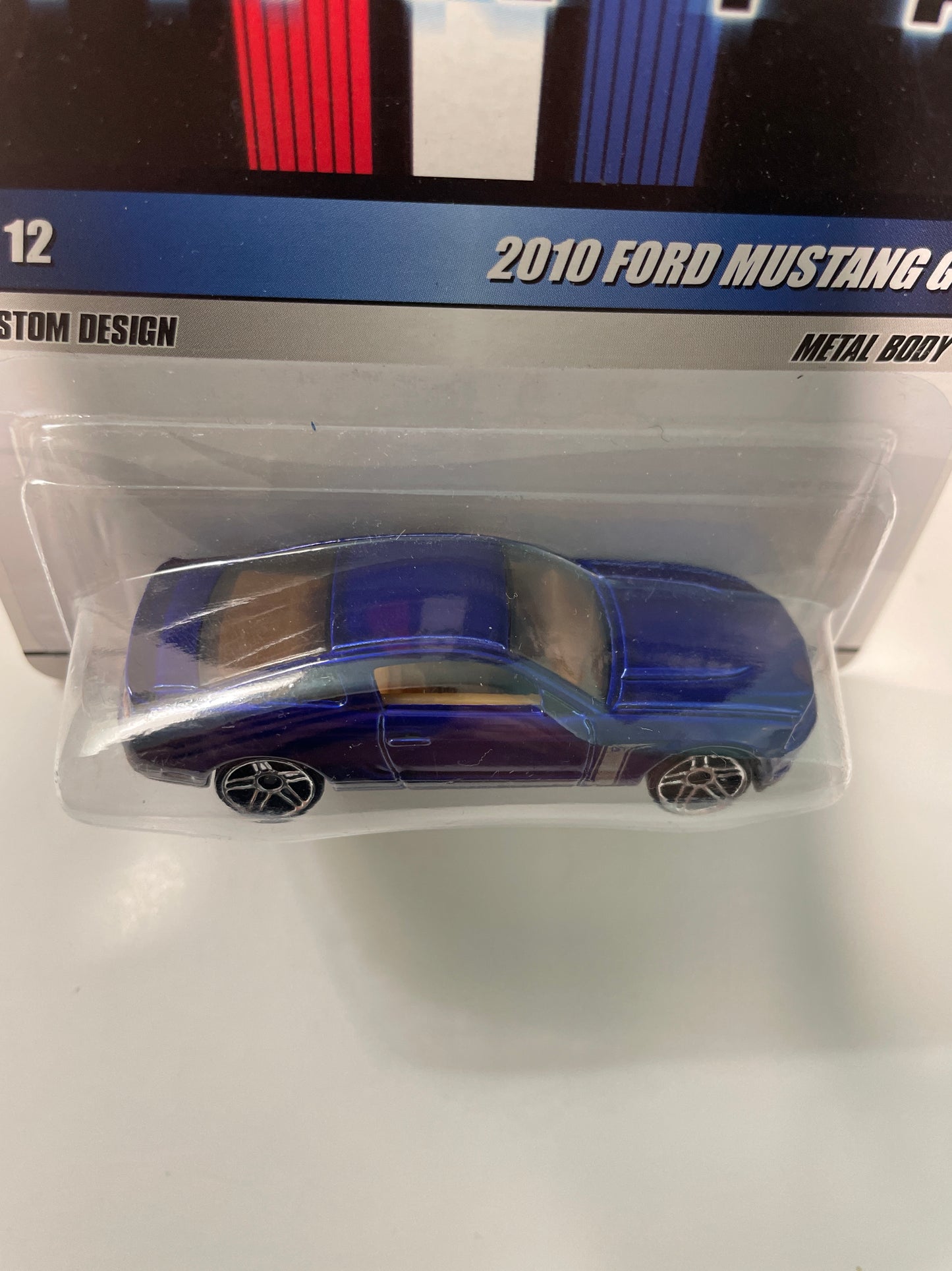 Hot Wheels 1/64 Mustang Mania 2010 Ford Mustang GT Blue - Damaged Card