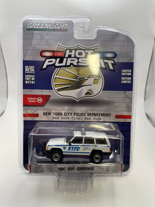 Greenlight 1/64 Hot Pursuit 1997 Jeep Cherokee White