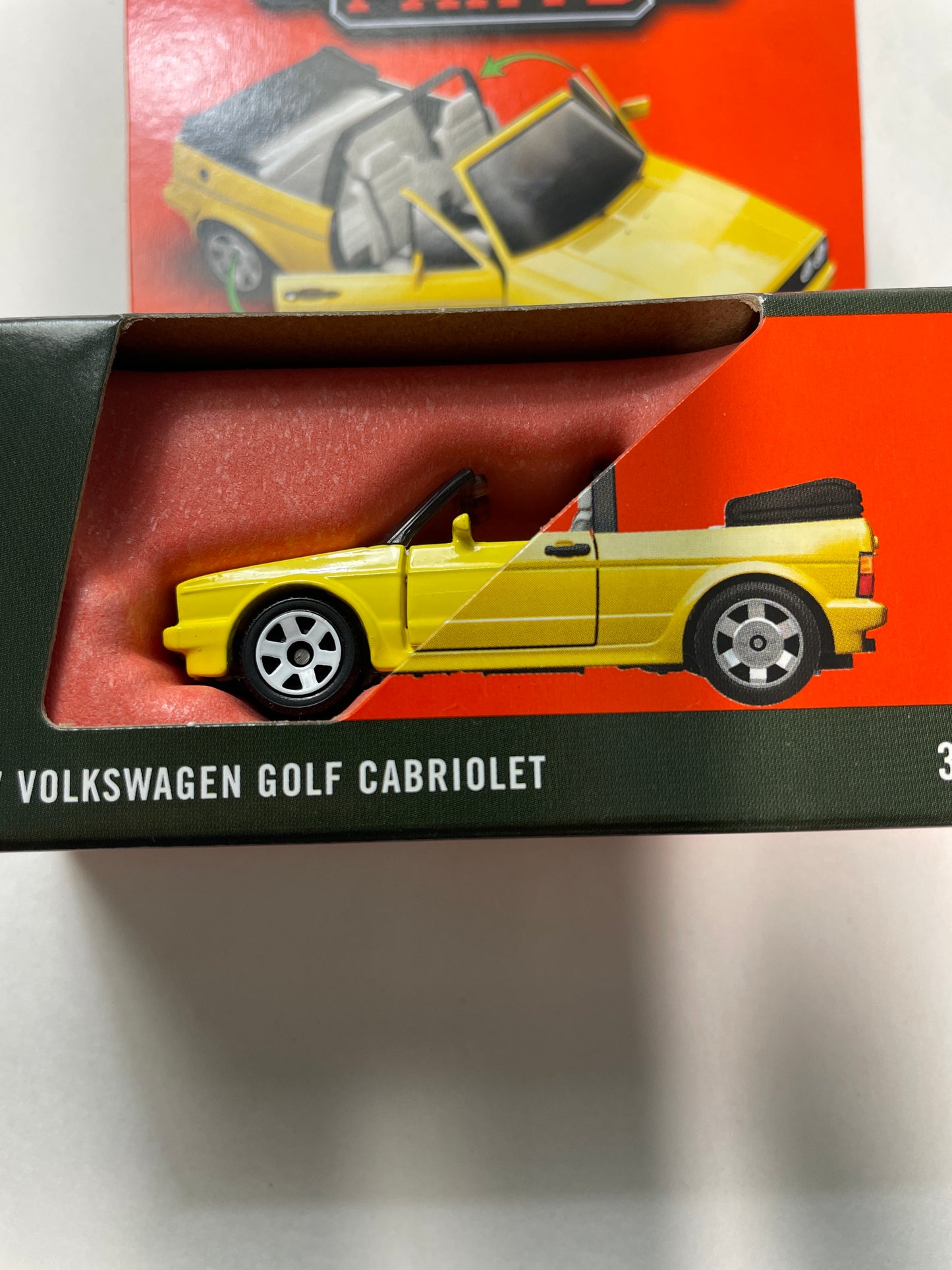 Matchbox 1/64 Moving Parts 1987 Volkswagen Golf Cabriolet Yellow - JHV67