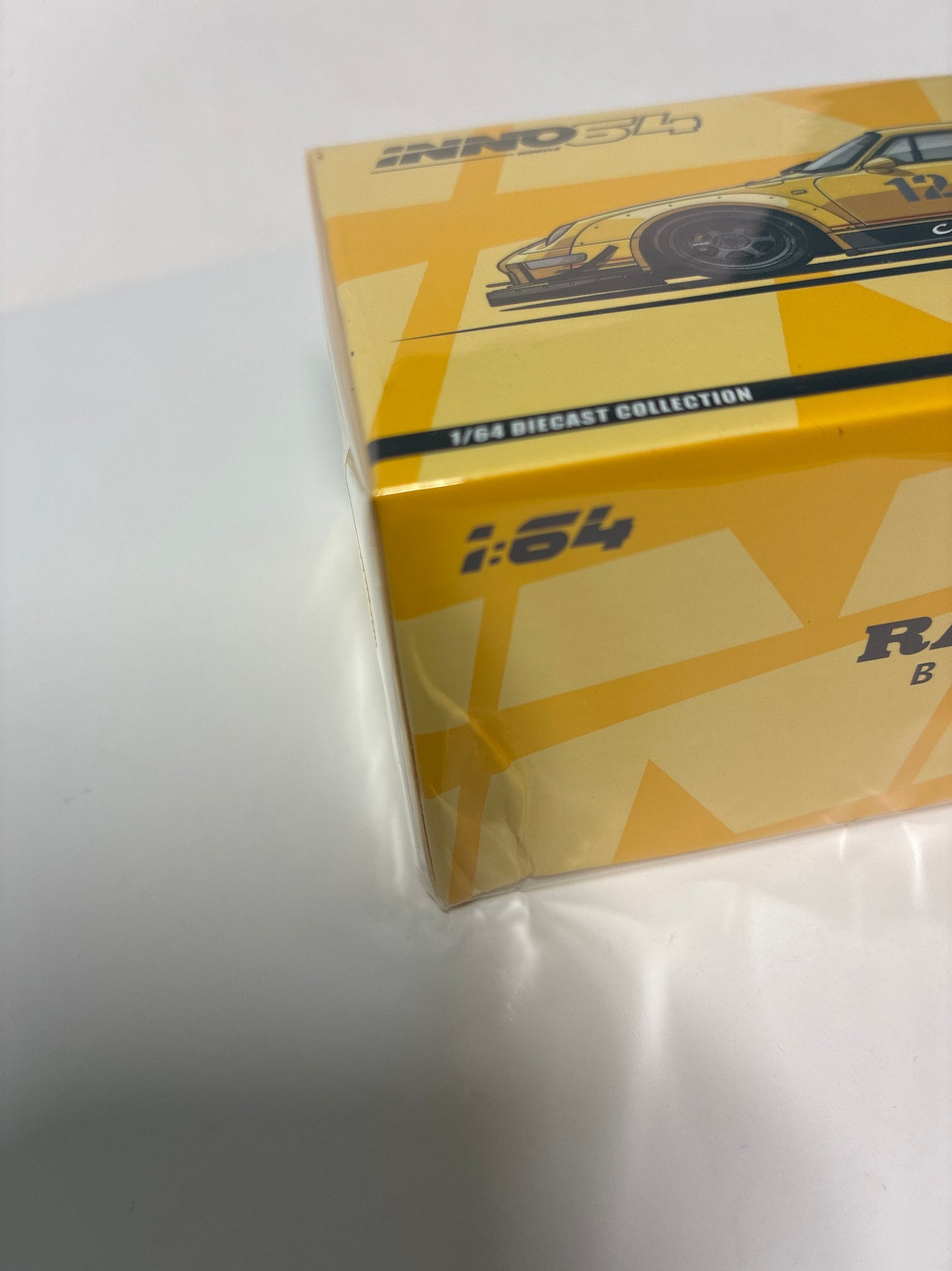 Inno64 1/64 2026 TDE RWB 993 Cinderella Yellow - IN64-RWB993-TDE26 - Damaged Box