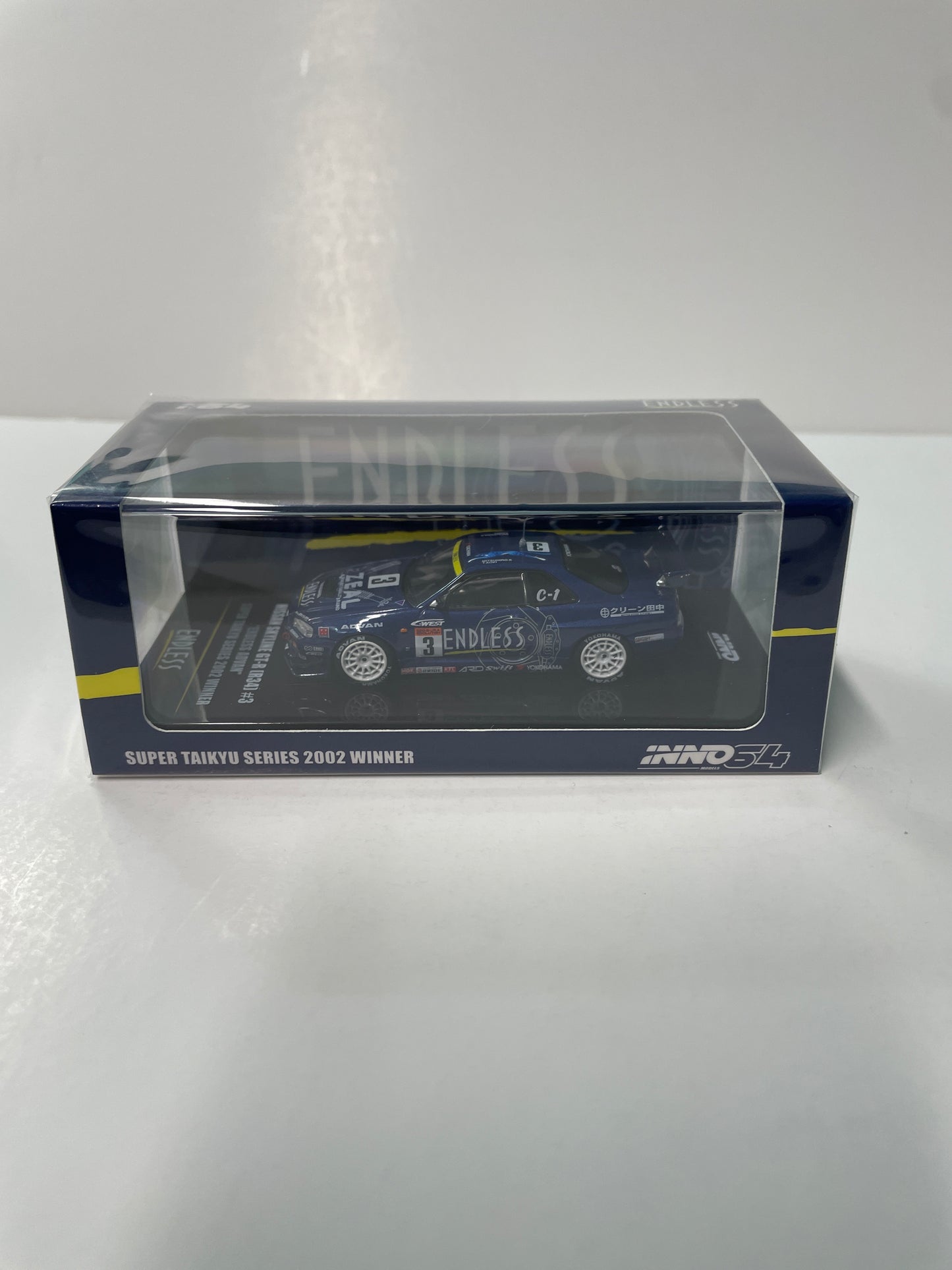 Inno64 1/64 Super Taikyu Series 2002 Winner Nissan Skyline GT-R (R34) #3 Endless Advan Blue