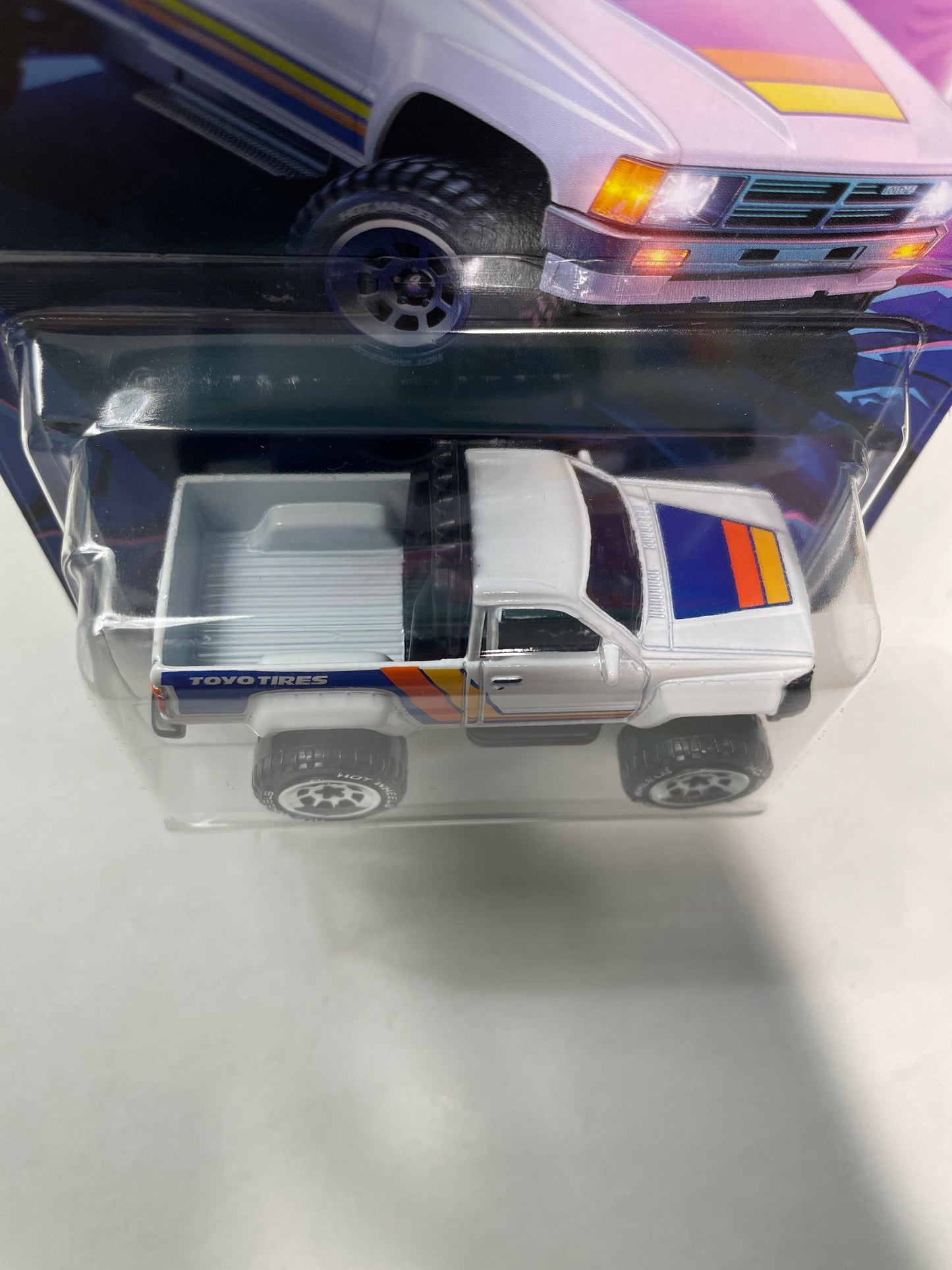 Hot Wheels 1/64 Tubular Trucks 1987 Toyota Pickup Truck White - Damaged Card