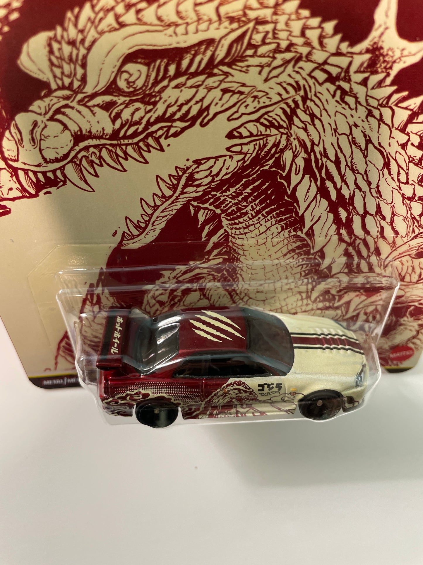 Hot Wheels 1/64 Pop Culture Godzilla Nissan Skyline GT-R (BNR34) Red - JHW90 - Damaged Box