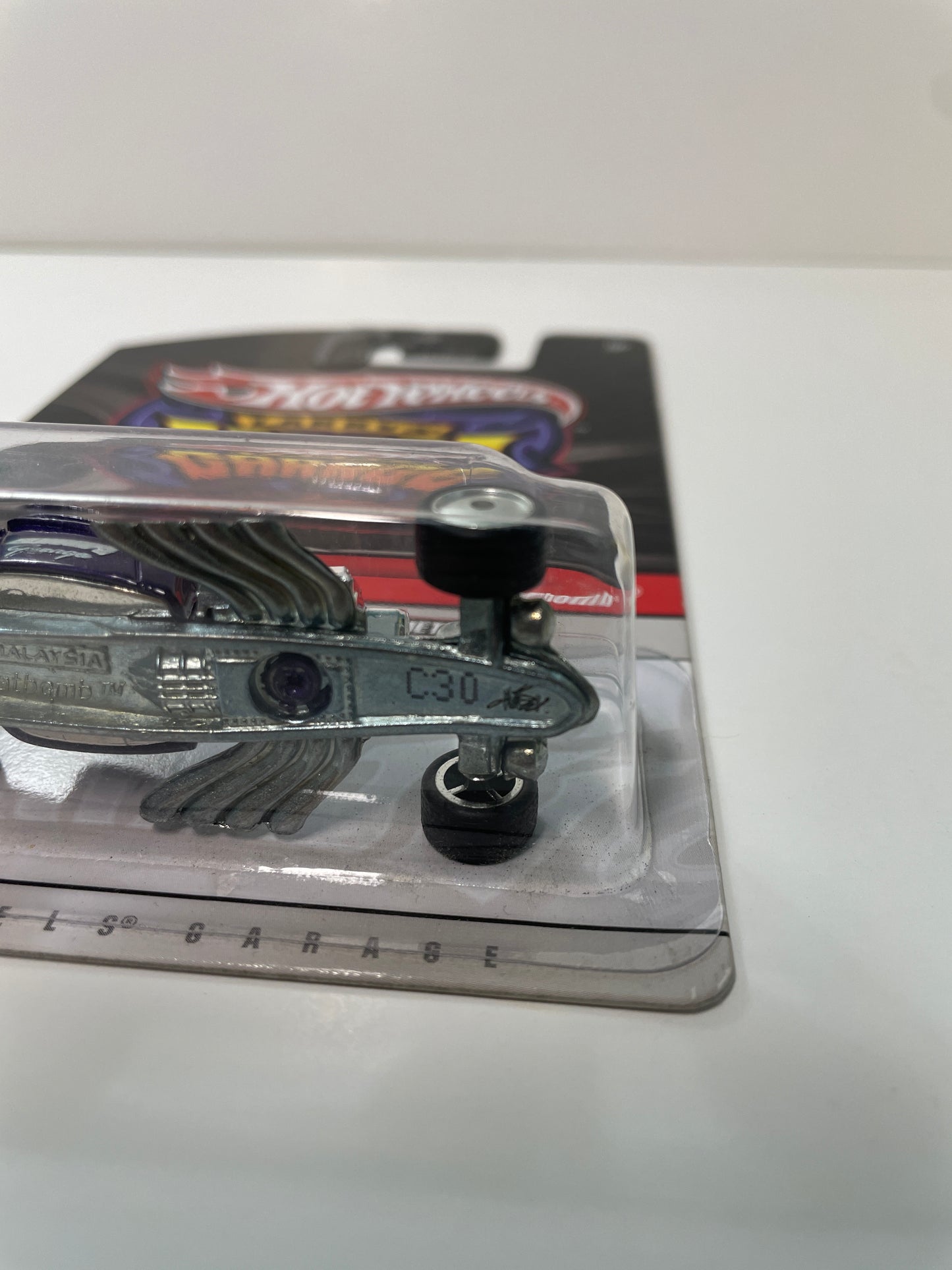 *Chase* Hot Wheels 1/64 Larry’s Garage Ratbomb Purple (Signed Base)