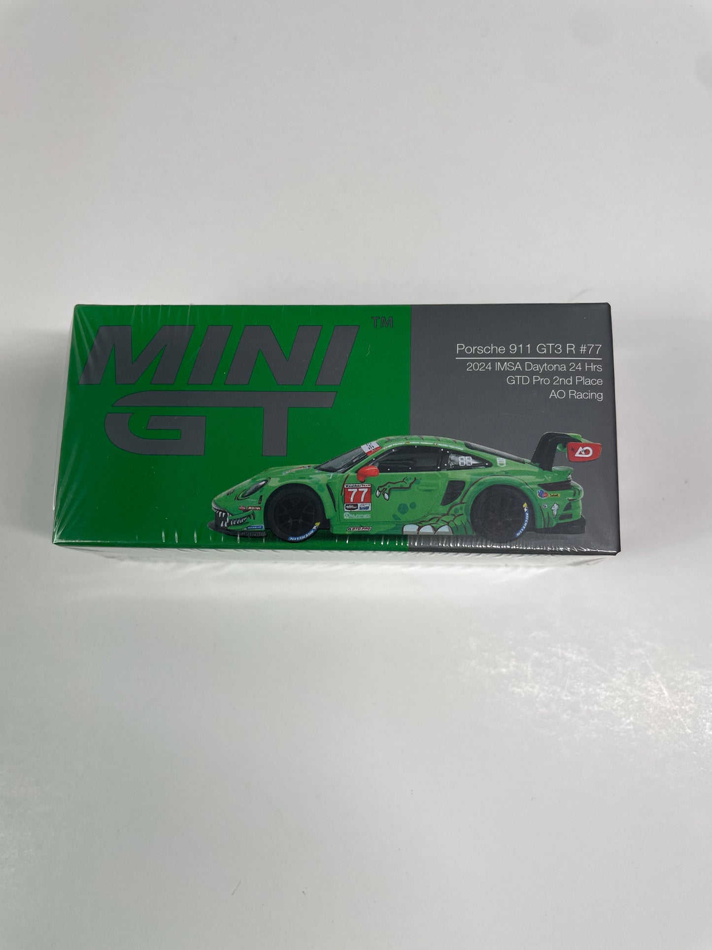 Mini GT 1/64 Porsche 911 GT3 R #77 2024 IMSA Daytona 24 Hrs GTD Pro 2nd Place AO Racing Rexy Green - MGT00889