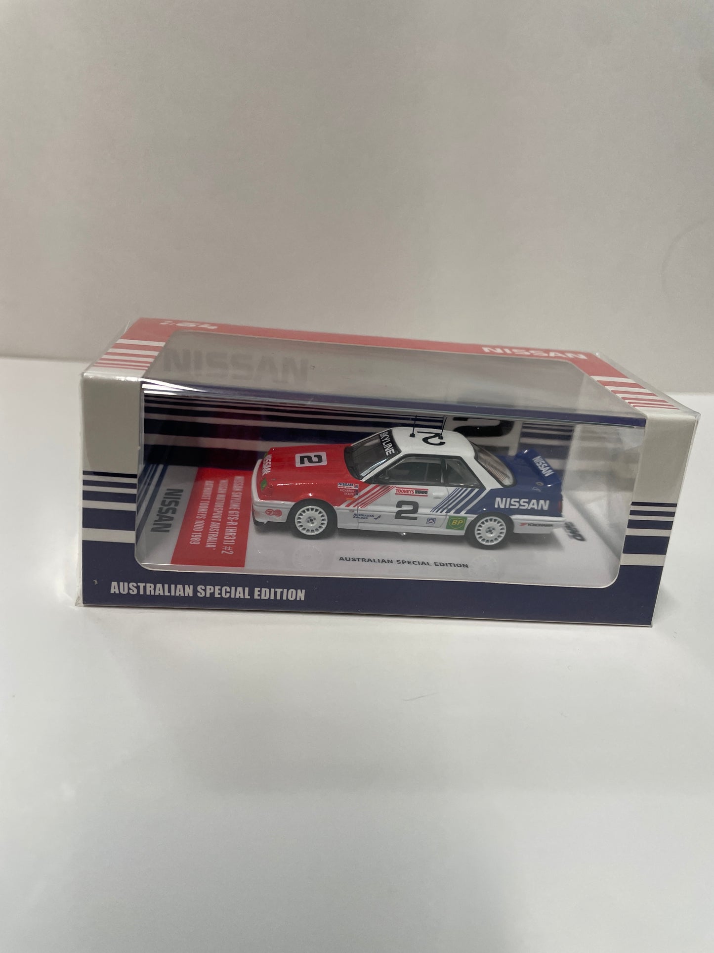 Inno64 1/64 Nissan Skyline GTS-R (HR31) #2 "Nissan Motorsport Australia" Red & White - IN64-R31-NMA89