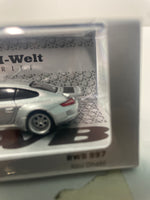 Tarmac Works 1/64 RWB 997 Abu Dhabi - ROAD64 Silver - Damaged Box