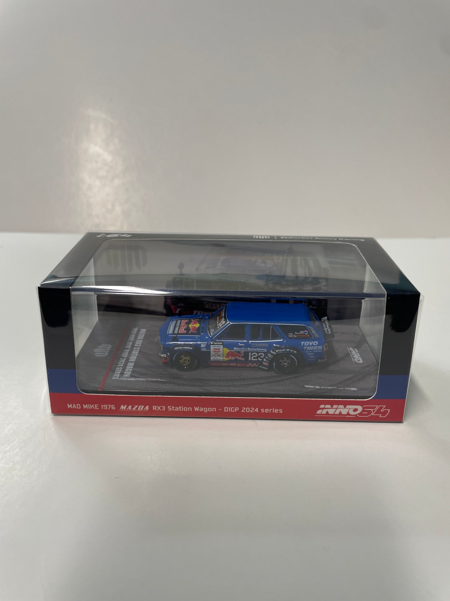 Inno64 1/64 Mazda RX3 Station Wagon Mad Mike 1976 D1GP 2024 Series Blue - IN64-RX3P-D1GP24