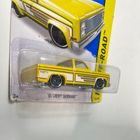 Hot Wheels 1/64 ‘83 Chevy Silverado Yellow - Damaged Card