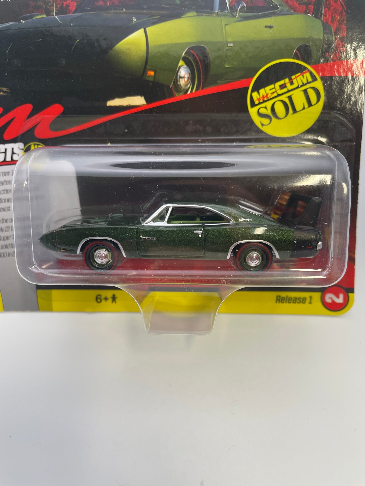 Johnny Lightning 1/64 Mecum Auctions 1969 Dodge Charger Daytona Green