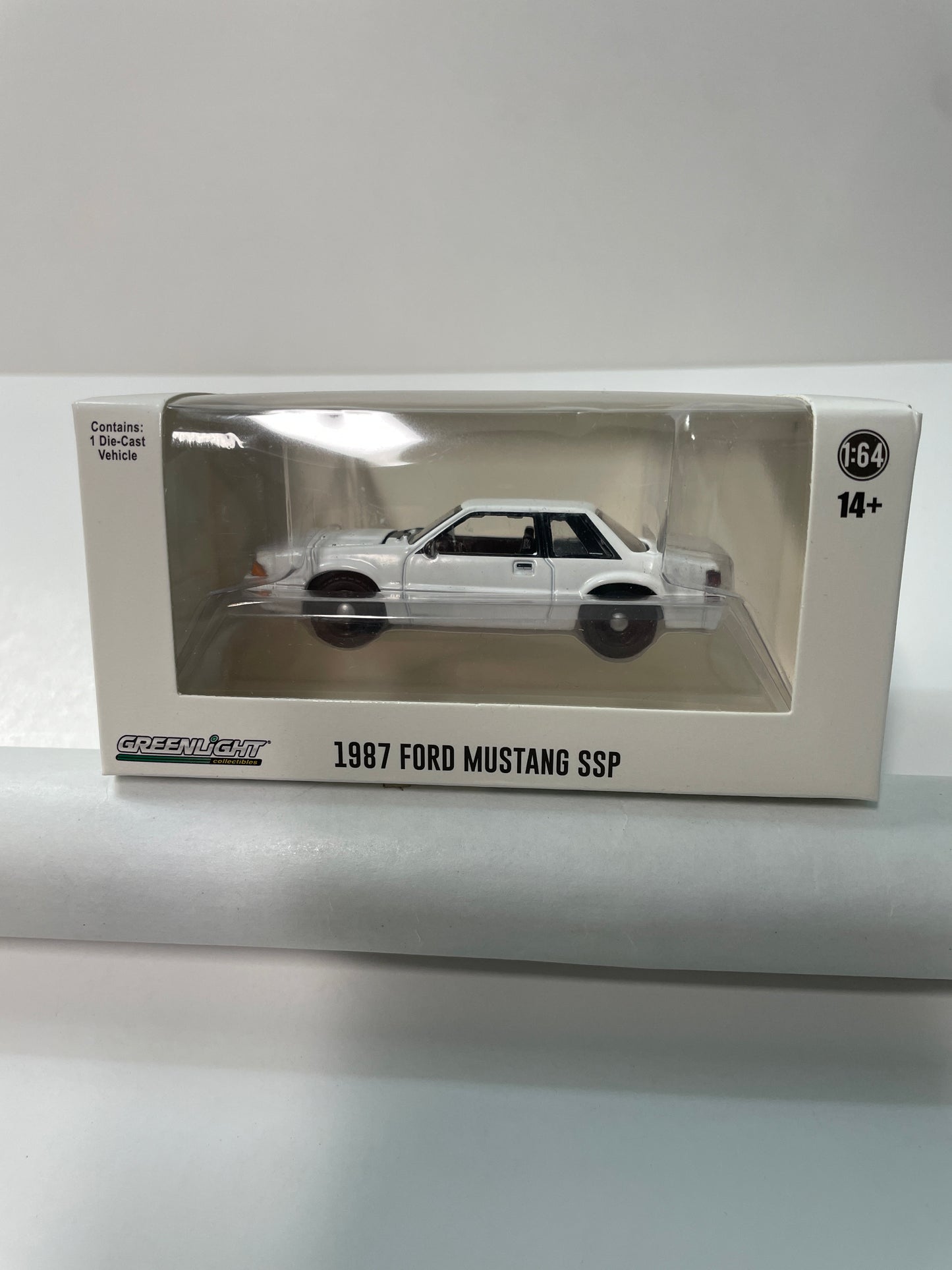 Greenlight 1/64 Hot Pursuit 1987 Ford Mustang SSP White