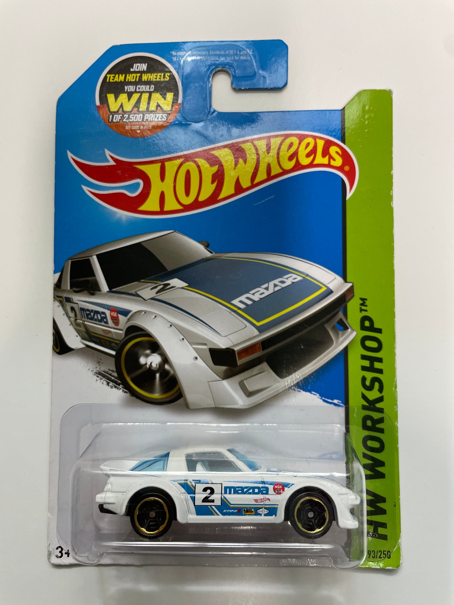 Hot Wheels 1/64 Mazda RX-7 White & Blue - Damaged Card