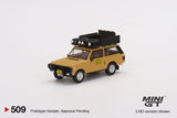 Mini GT 1/64 Range Rover 1982 Camel Trophy Papua New Guinea Team USA Yellow