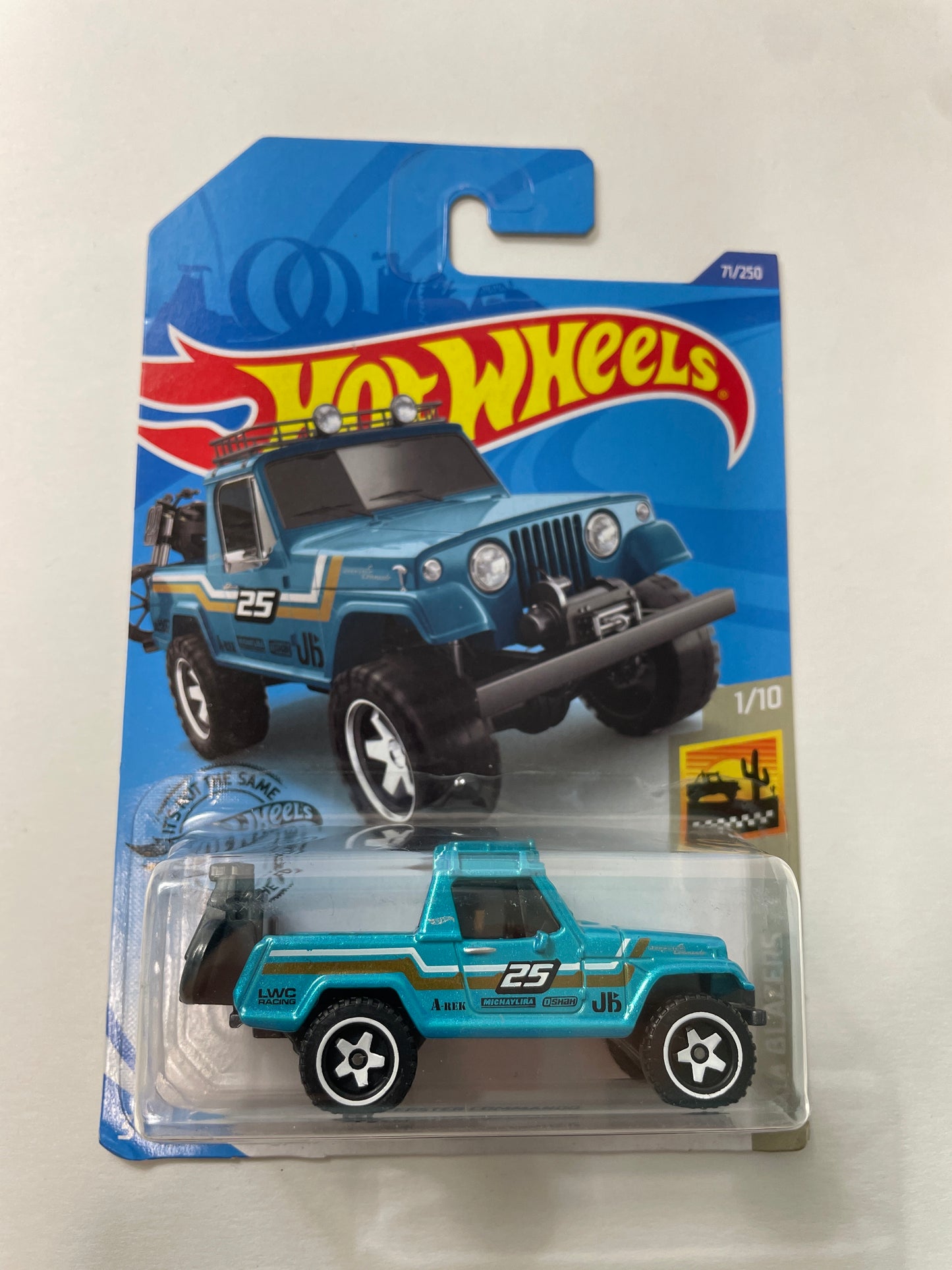 Hot Wheels 1/64 ‘67 Jeepster Commando Blue - Damaged Box