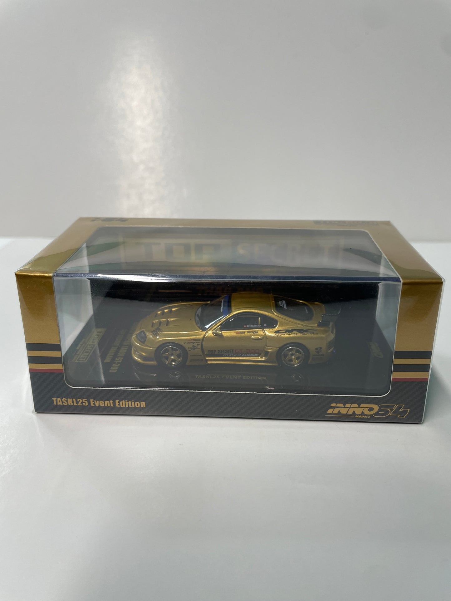 Inno64 1/64 2026 Tokyo Auto Salon TASKL25 Event Edition Toyota Supra (A80) GT-300 Gold - IN64-A80TSTH-TASKL25