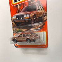 Matchbox 1/64 1980 AMC Eagle Brown - Damaged Card