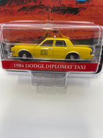 Greenlight 1/64 Hollywood Thelma & Louise 1984 Dodge Diplomat Taxi Yellow