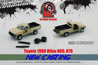 BM Creations 1/64 Toyota Hilux, Ivory RHD w/ Extra Wheels & Bumpers