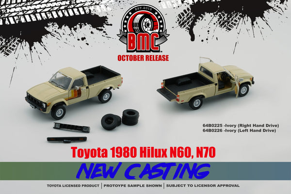 BM Creations 1/64 Toyota Hilux, Ivory RHD w/ Extra Wheels & Bumpers