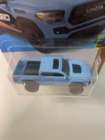 Hot Wheels 1/64 ‘20 Toyota Tacoma Blue Error - Damaged Card