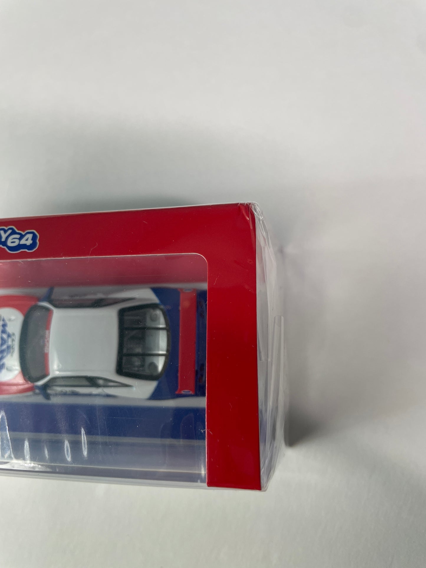 Tarmac Works 1/64 Nissan NISMO GT-R LM (1995 Launch Ver.) - HOBBY64 White & Blue - T64-067-TC - Damaged Box