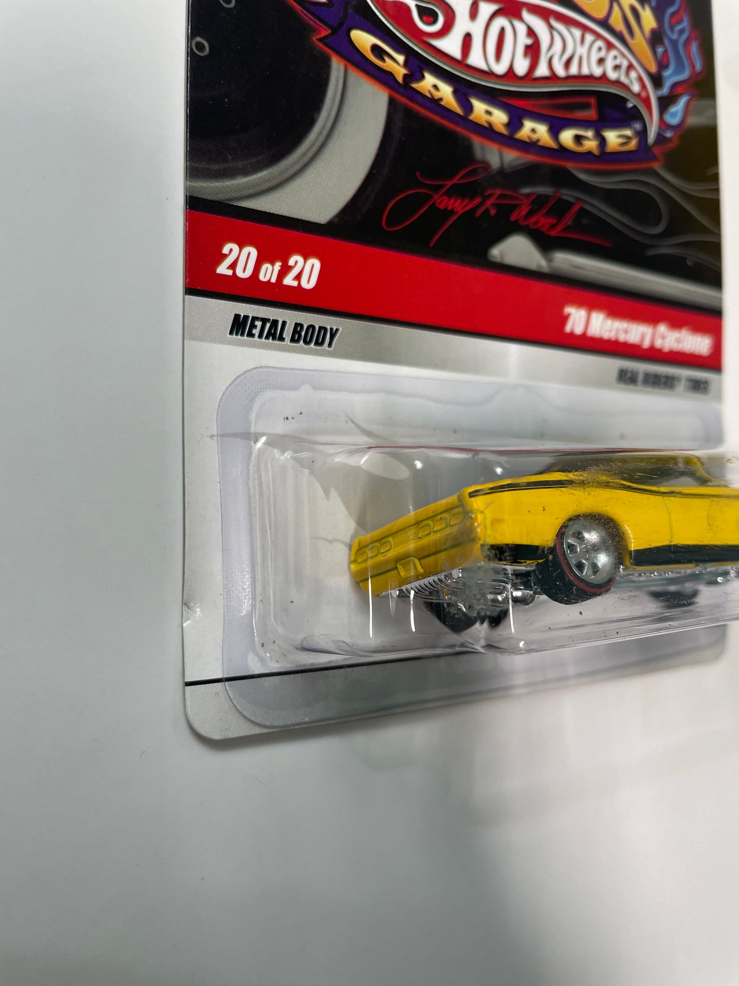 Hot Wheels 1/64 Larry’s Garage ‘70 Mercury Cyclone Yellow - Damaged Card