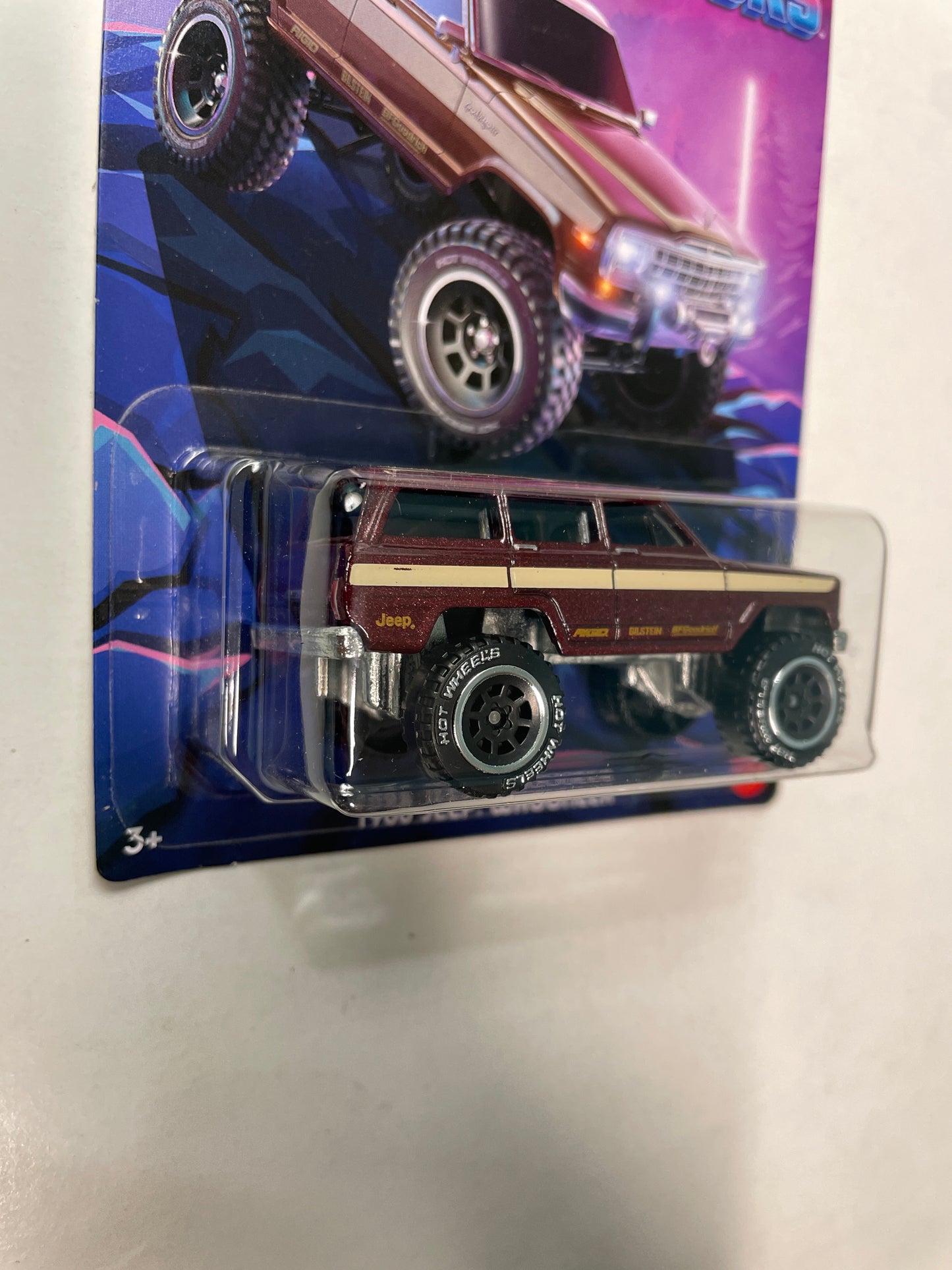 Hot Wheels 1/64 Tubular Trucks 1988 Jeep Wagoneer Red - Damaged Card