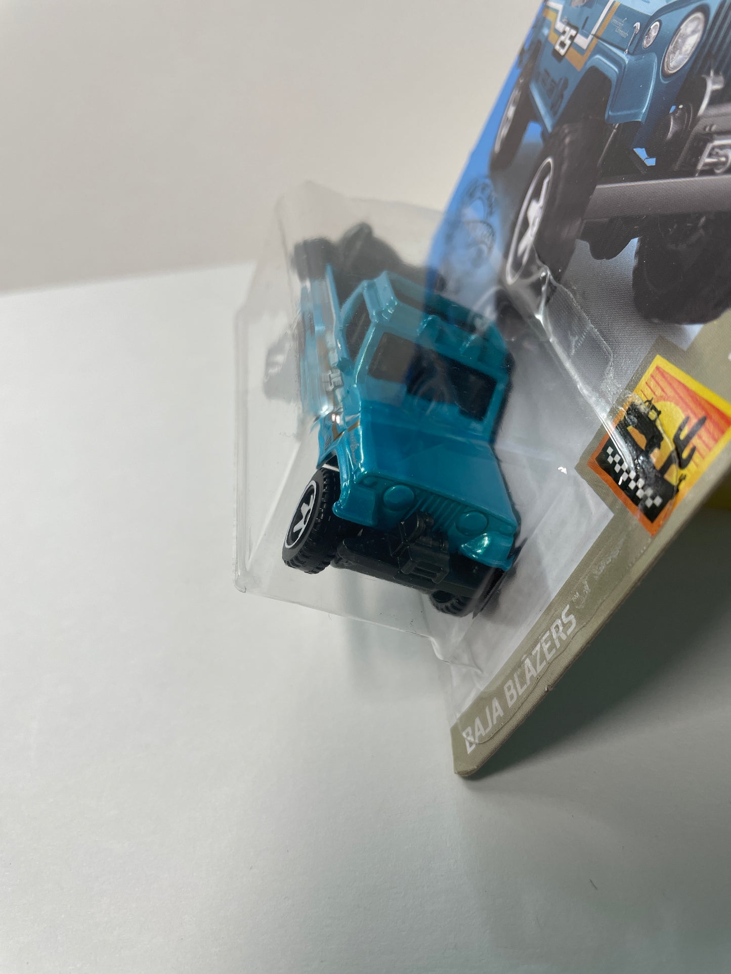 Hot Wheels 1/64 ‘67 Jeepster Commando Blue - Damaged Box