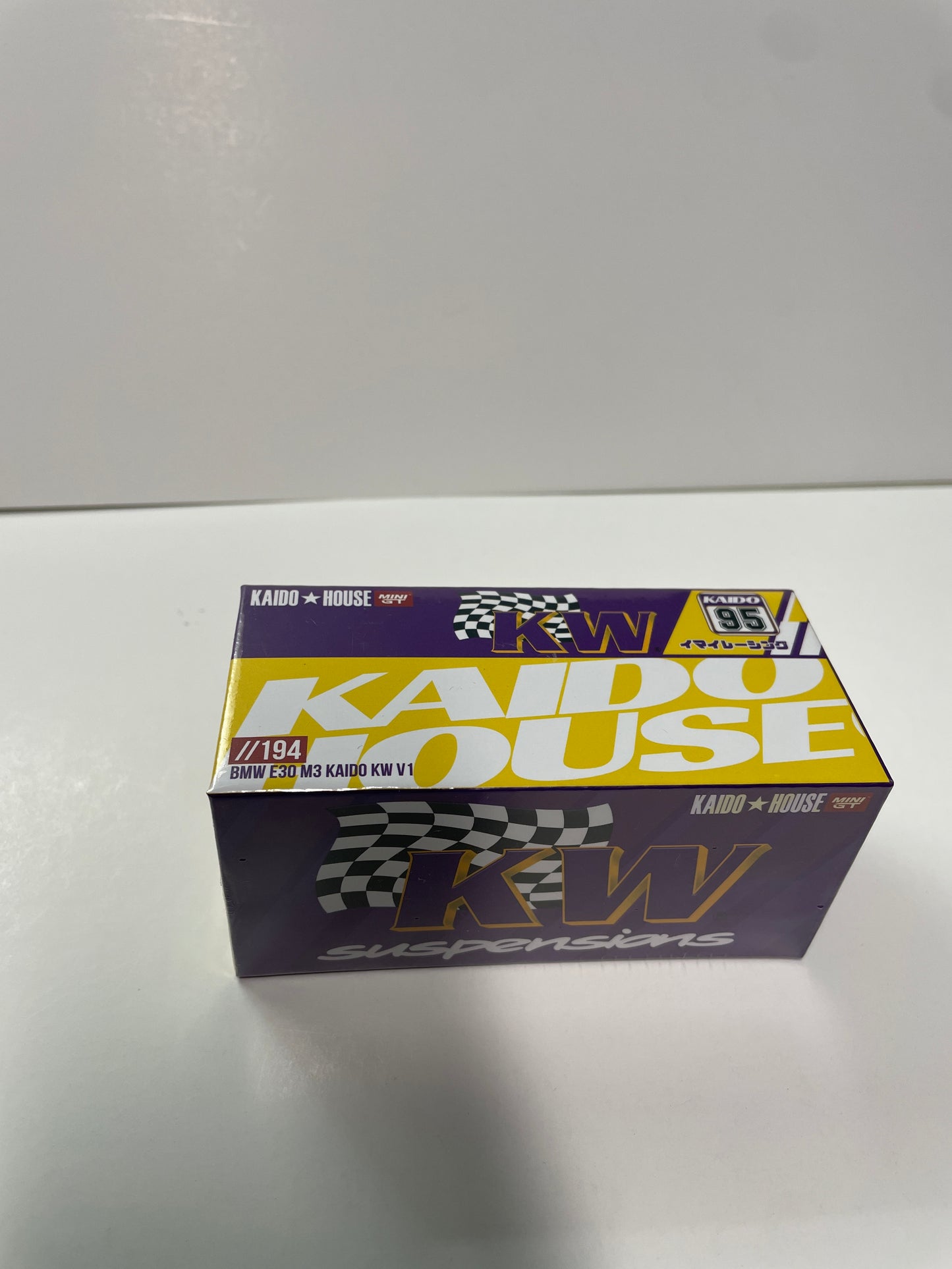 Mini GT x Kaido House 1/64 BMW M3 Kaido KW V1 Purple & Yellow - MHMG194