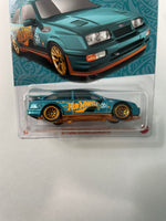 Hot Wheels 1/64 Pearl & Chrome ‘87 Ford Sierra Cosworth Teal & Gold - Damaged Card