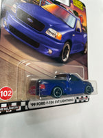 Hot Wheels 1/64 Boulevard Mix W ‘99 Ford F-150 SVT Lightning Blue - Damaged Card