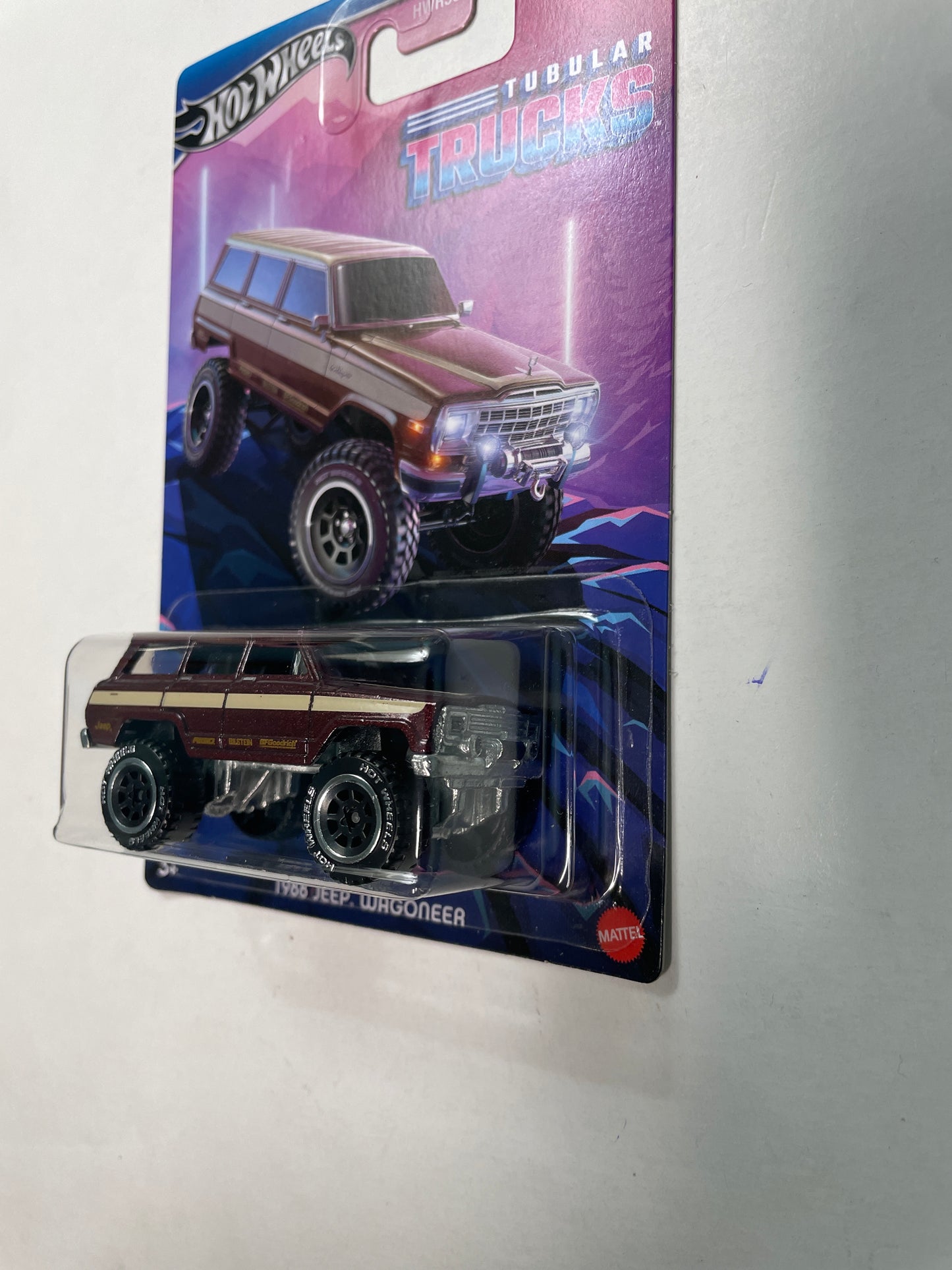 Hot Wheels 1/64 Tubular Trucks 1988 Jeep Wagoneer Red - Damaged Card