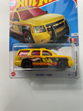 Hot Wheels 1/64 ‘07 Chevy Tahoe Yellow - Damaged Card