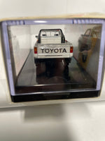 Para64 1/64 1984 Toyota Hilux Single Cab - TRD Ironman White