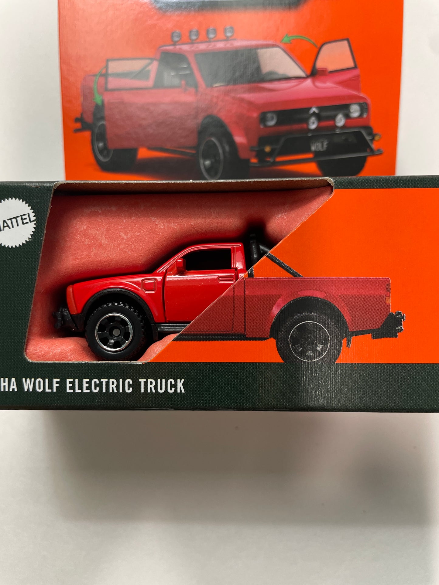 Matchbox 1/64 Moving Parts Alpha Wolf Electric Truck Red