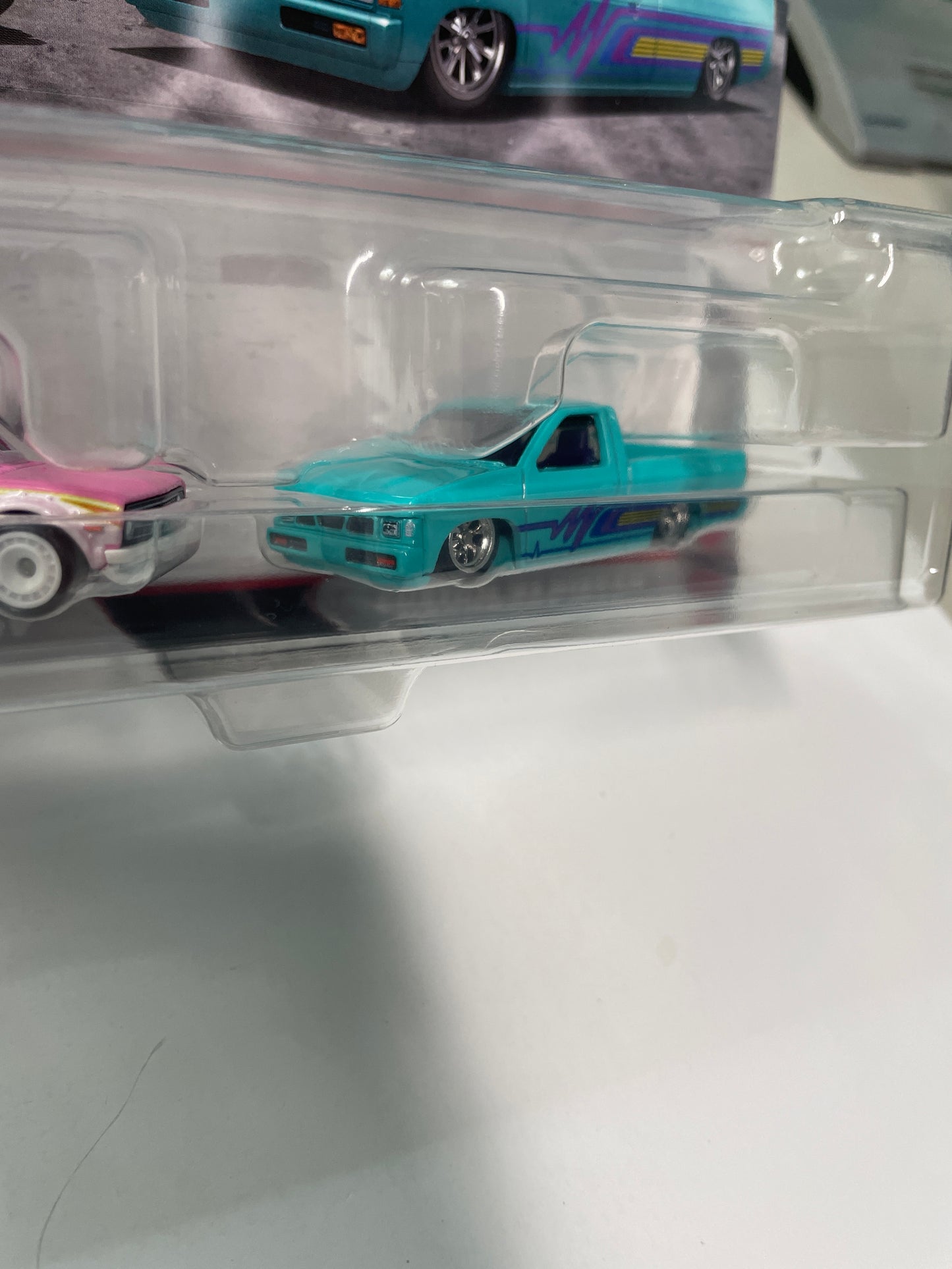 Hot Wheels 1/64 Premium Car Culture 2 Pack 1975 Datsun Sunny Truck (B120) & Custom ‘93 Nissan Hardbody (D21)