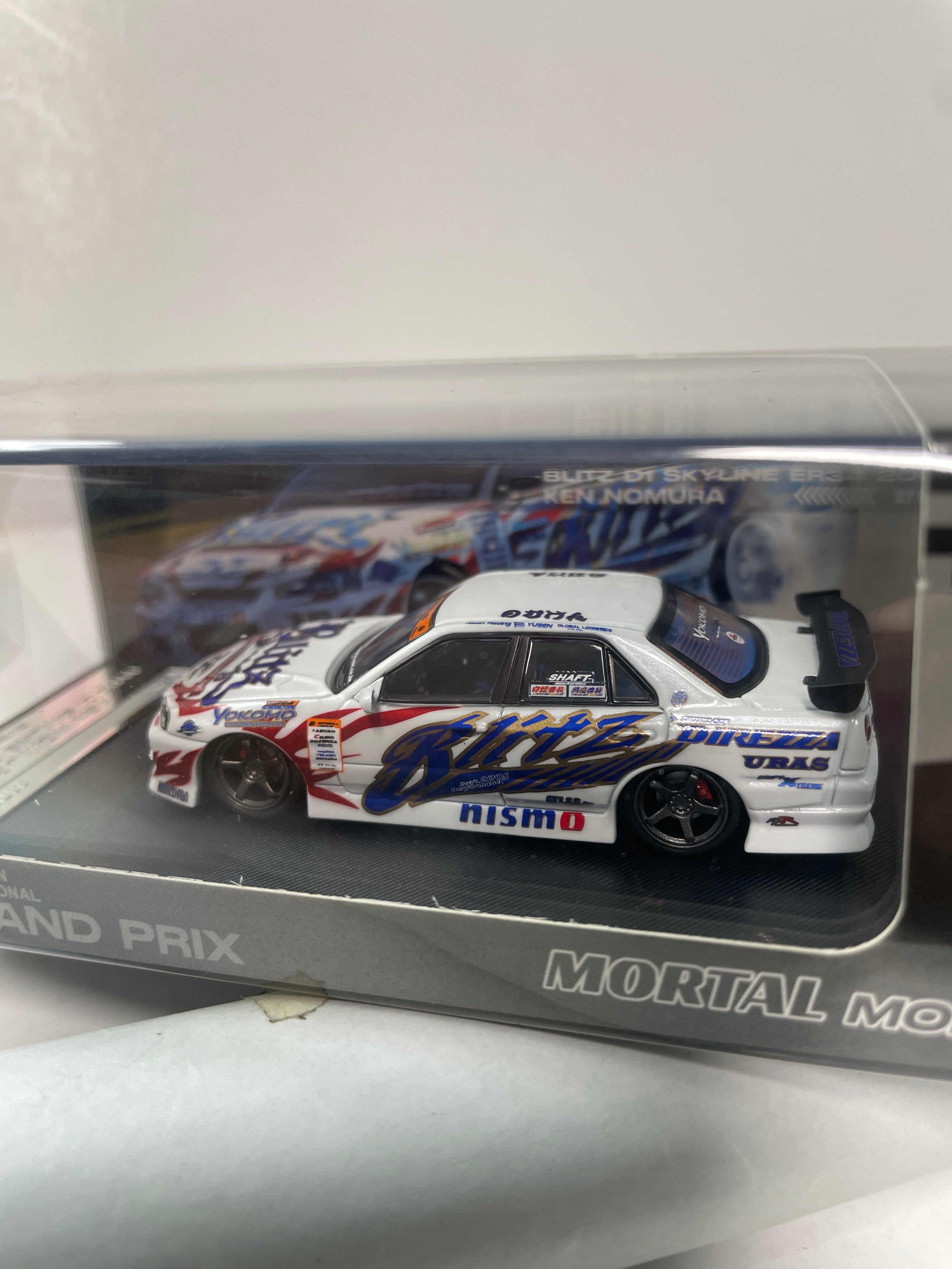 Mortal Model 1/64 Nissan Skyline Blitz D1 ER34 2005 White – Flipn