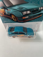 Hot Wheels 1/64 Pearl & Chrome ‘87 Ford Sierra Cosworth Teal & Gold - Damaged Card