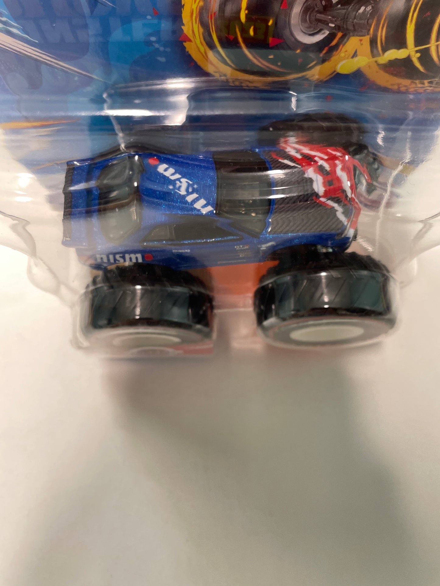 Hot Wheels 1/64 Monster Trucks Treasure Hunt Nissan Blue - Damaged Card