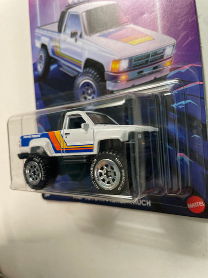 Hot Wheels 1/64 Tubular Trucks 1987 Toyota Pickup Truck White - Damaged Card
