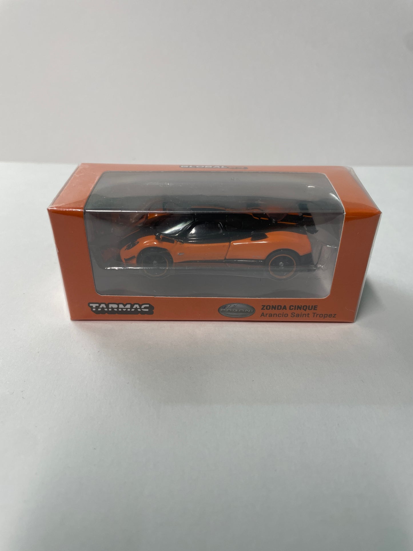 Tarmac Works Global64 1/64 Pagani Zonda Cinque Arancio Saint Tropez Orange & Black