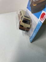 Hot Wheels 1/64 1986 Toyota Van Brown - Damaged Box