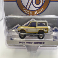 Greenlight 1/64 Hobby Exclusive Colorado 76 Gold Rush 1976 Ford Bronco White & Gold - Damaged Box